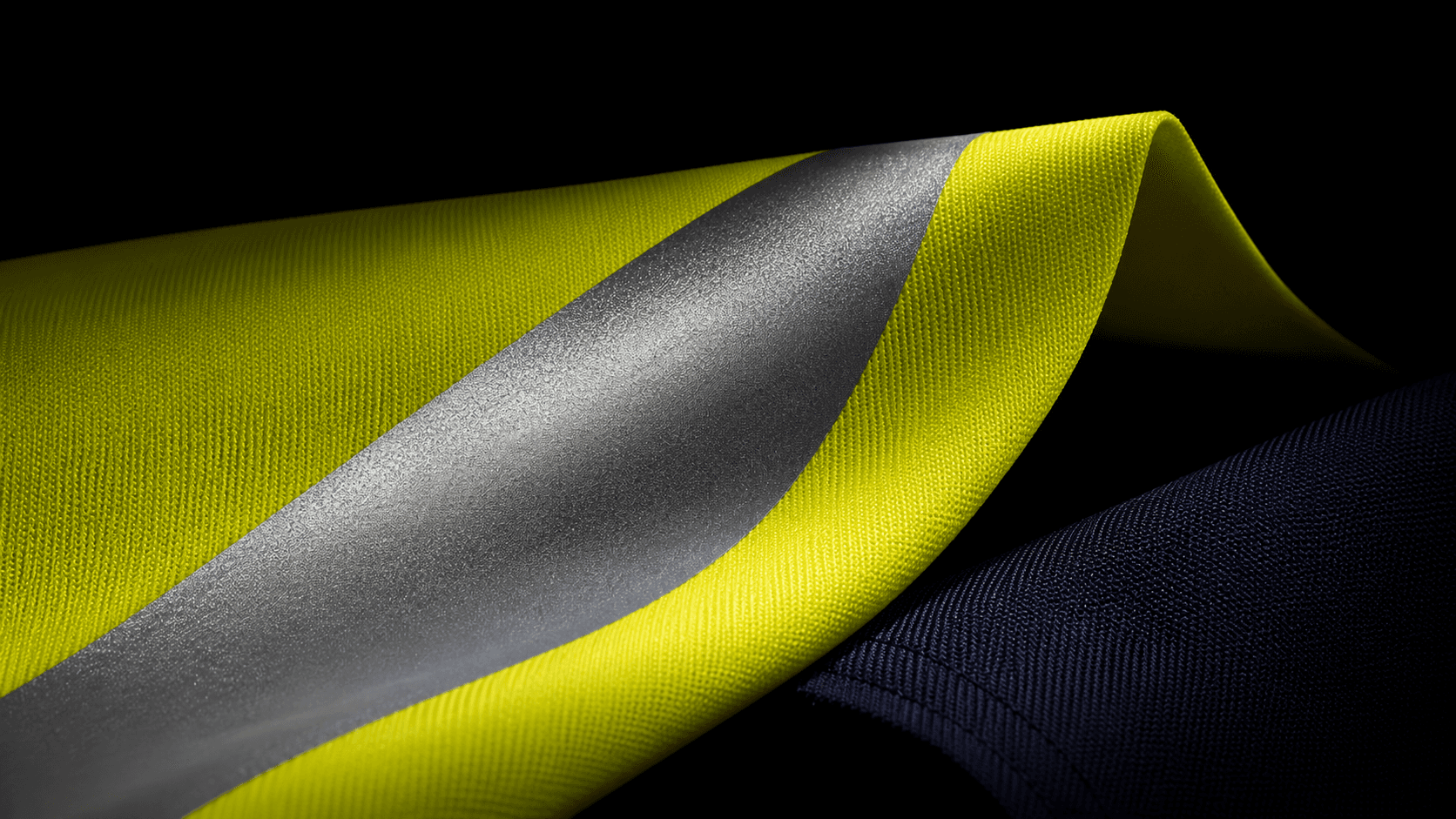 ISO 20471:2013: high-visibility clothing requires a system of color, retroreflection, and material placement